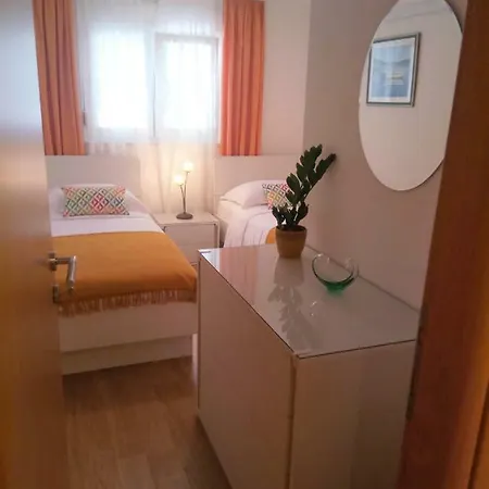 Tiha *